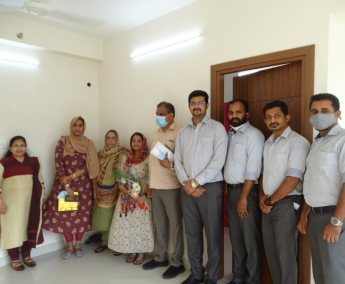 Our team with Ms.Rasheema Savad and family of apartment no. D03 in Crescent Lavender, after handing over