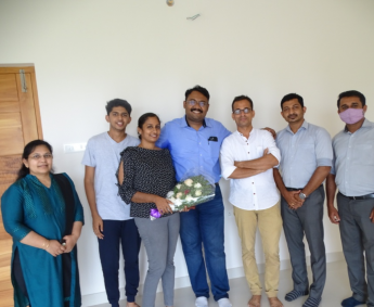 Our team with Dr. Rajneesh A Rajan and family of apartment no. E10 in Crescent Lavender, after handing over