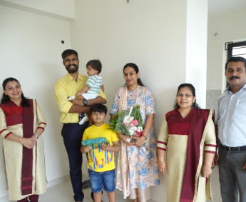 Our team with Mr.Bineesh P and family of apartment no. D08 in Crescent Lavender, after handing over