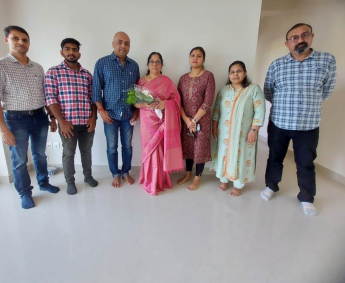 Our team with Mrs. Indira Balakrishnan and family of apartment no. A05 in Crescent Lavender, after handing over