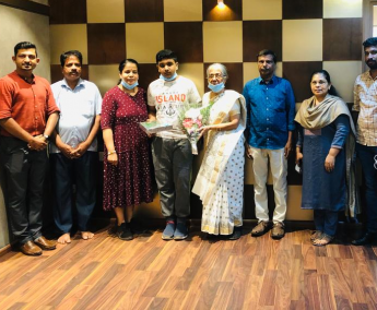 Our team with Mr.Rajan Chinnaswamy R and family of apartment no. E12 in Crescent Lavender, after handing over