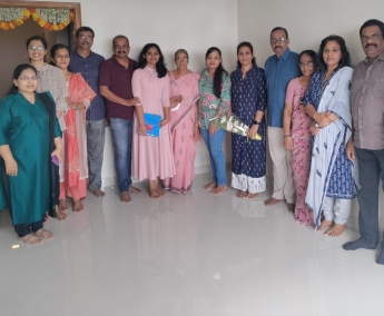 Our team with Mr.C.V.Praveen Kumar and family of apartment no. D13 in Crescent Lavender, after handing over