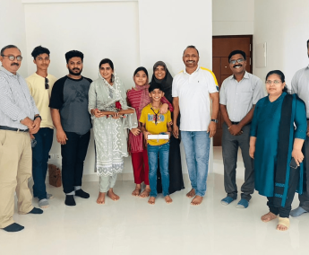 Our team with Mr. Abdul Shukoor and family of apartment No. E 15 in Triton Crescent ,after handing over