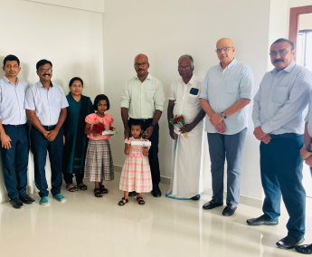 Our team with Mr. Manoharan and family of apartment No.C 18 in Triton Crescent ,after handing over