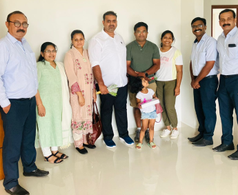 Our team with Mr. Hilton and Mr. Mathew and family of apartment No. C 17 in Triton Crescent ,after handing over