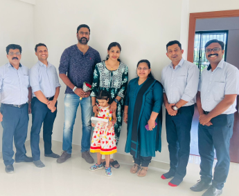Our team with Mr. Praveen Kumar and family of apartment No. A 03 in Triton Crescent ,after handing over