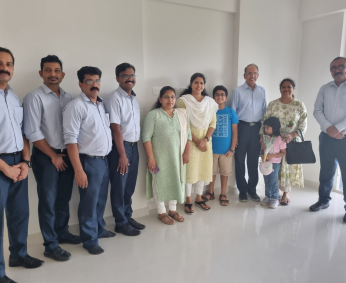 Our team with Ms. Anupama Unnikrishnan and family of apartment No. C 07 in Triton Crescent ,after handing over