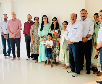 Our team with Ms. Anju Sachin and family of apartment No. C 12 in Triton Crescent ,after handing over
