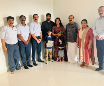 Our team with Mr. Midhun Vijayan and family of apartment No. A 06 in Triton Crescent ,after handing over