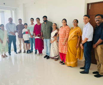 Our team with Mr.Anil Kumar and family of apartment No. C 20 in Triton Crescent ,after handing over
