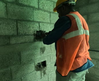 Shows Switch box fixing work in progress on 4th floor.