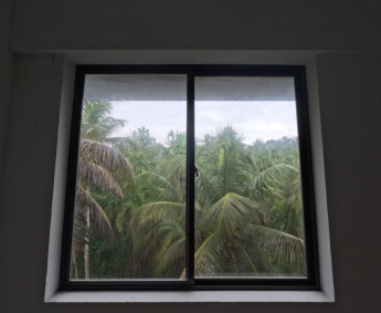 A view of Aluminium window frame fixing work completed in F type apartments 