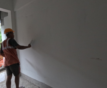 2nd coat putty application work  is in progress on 2nd floor.
